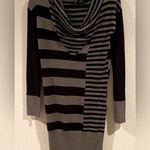 Beautiful black and grey sweater dress. Knee length and slim fit.